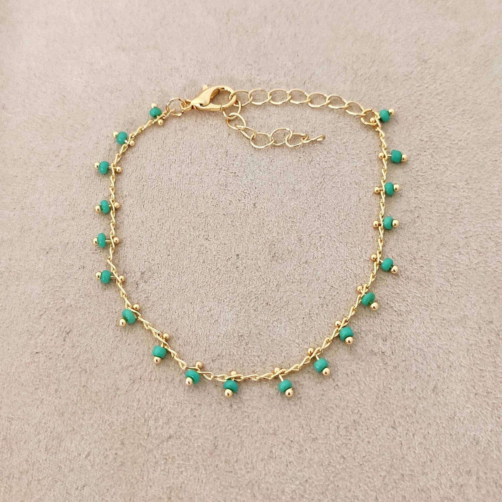 Gold Plated Crystal Stone Arranged Chain Bracelet on Brass