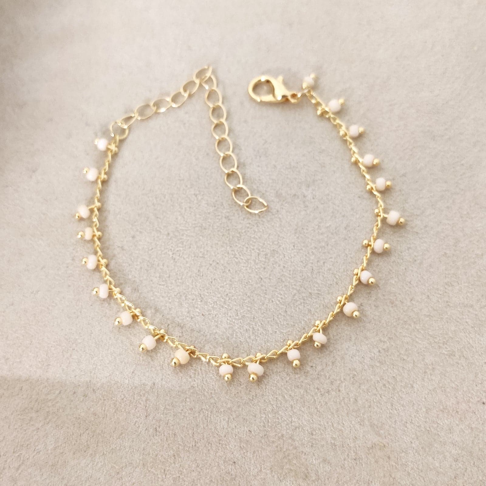 Gold Plated Crystal Stone Arranged Chain Bracelet on Brass