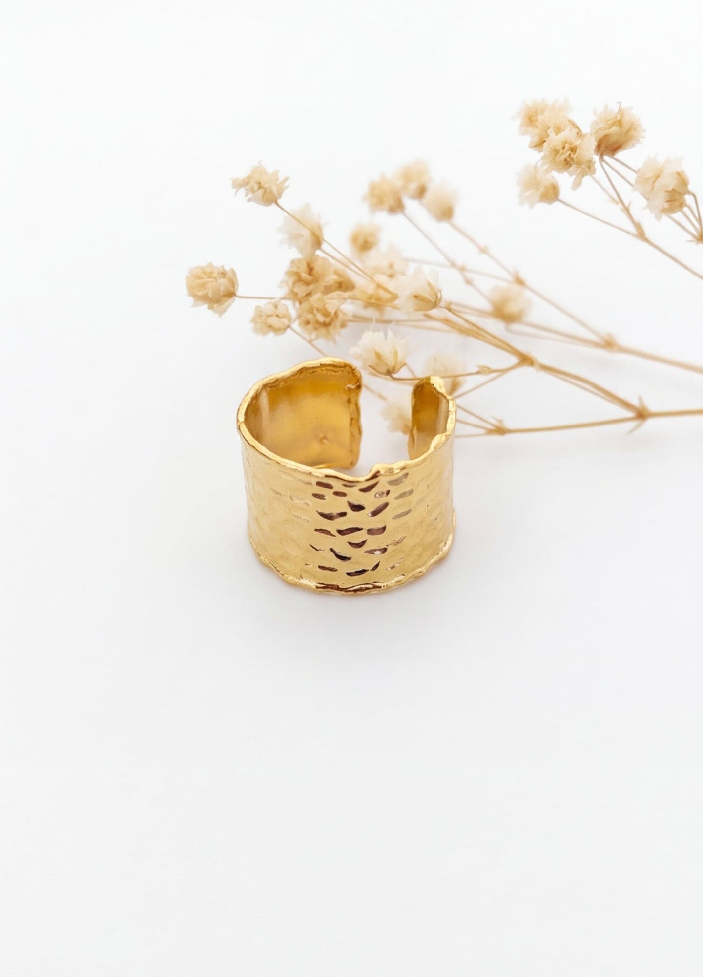 Gold plated adjustable ring on brass
